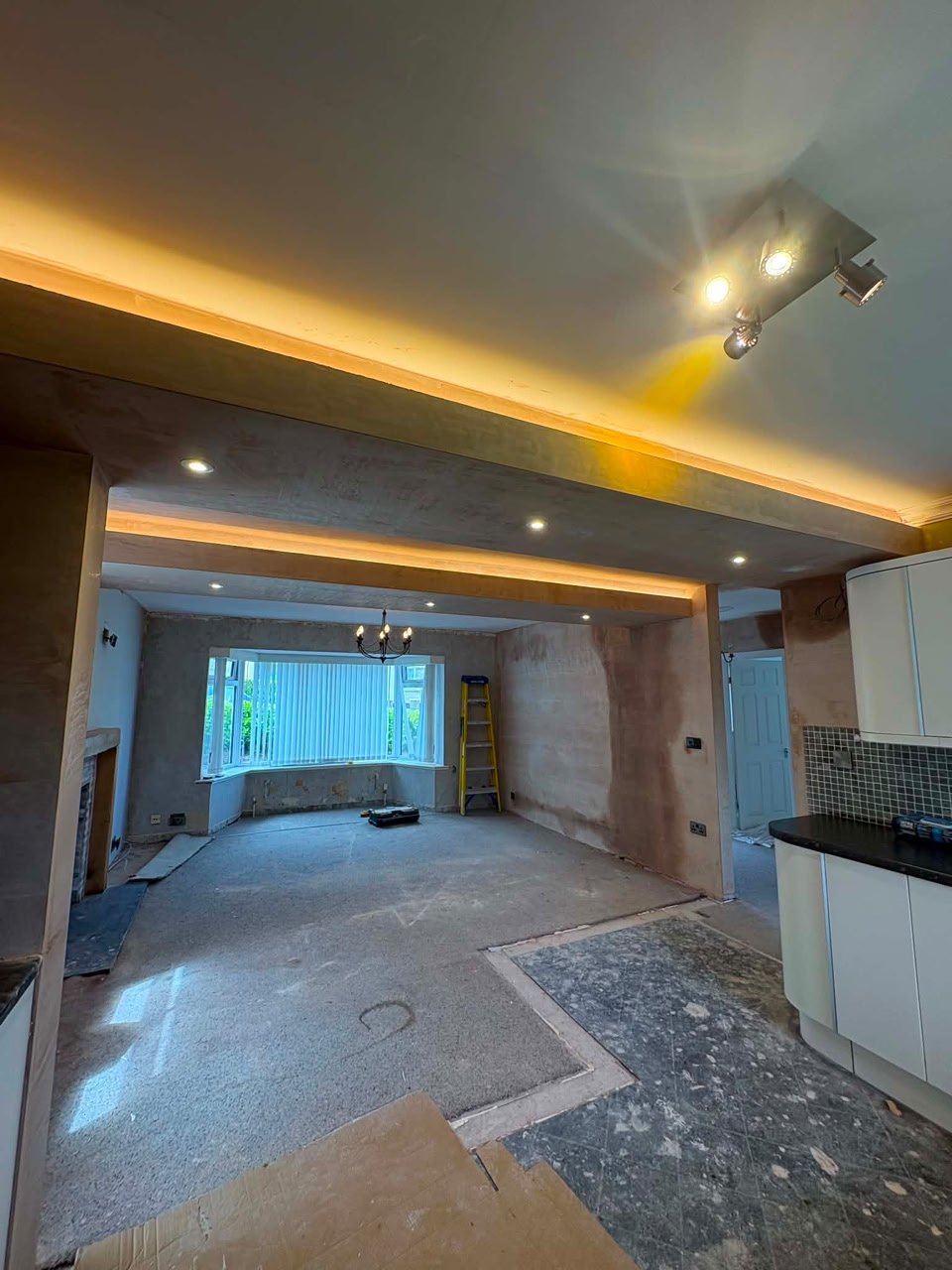 Kitchen knock-through — view through new opening